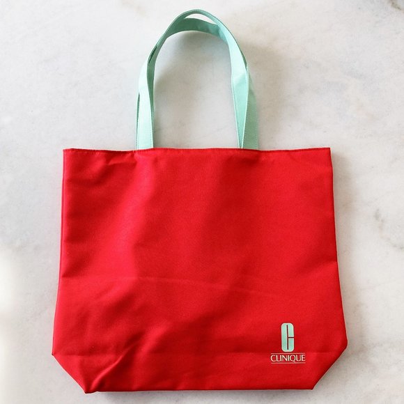 3/$36 - New! Clinique reversible tote bag red w/ mint green handles / polka dot - Picture 1 of 5